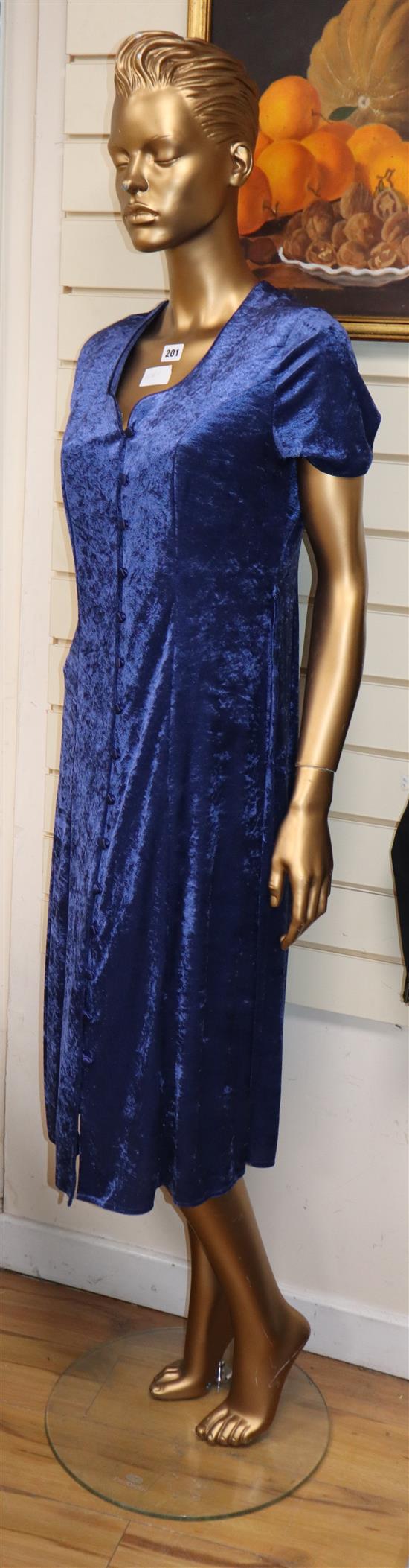 A mannequin with velvet dress